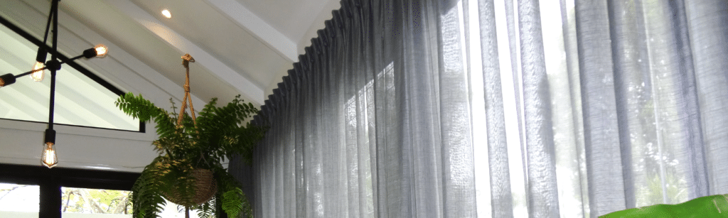 curtains in a sheer, light linen fabric called midnight